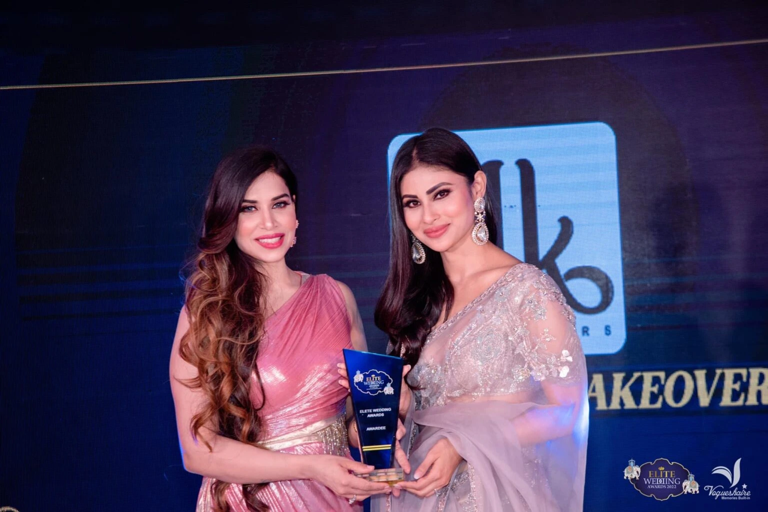 arvindkaur holding her award for best makeup artist .